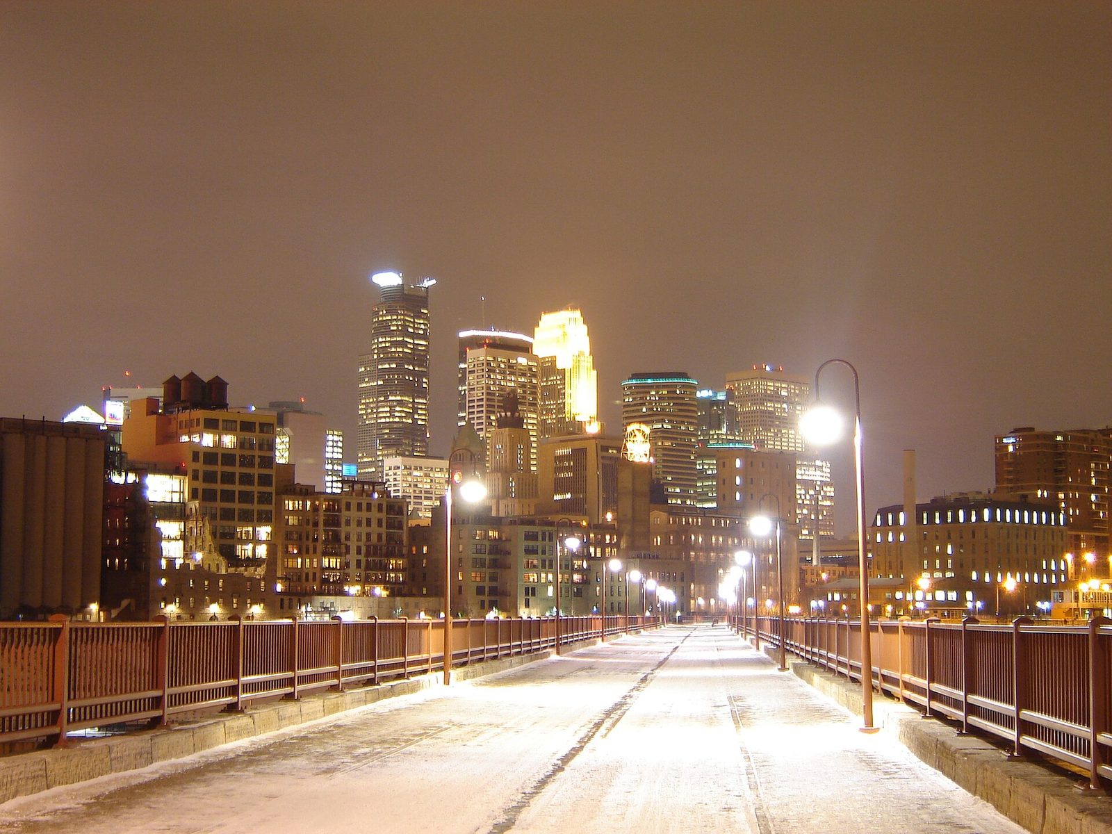 Downtown Minneapolis at night from the Stone Arch Bridge (winter)